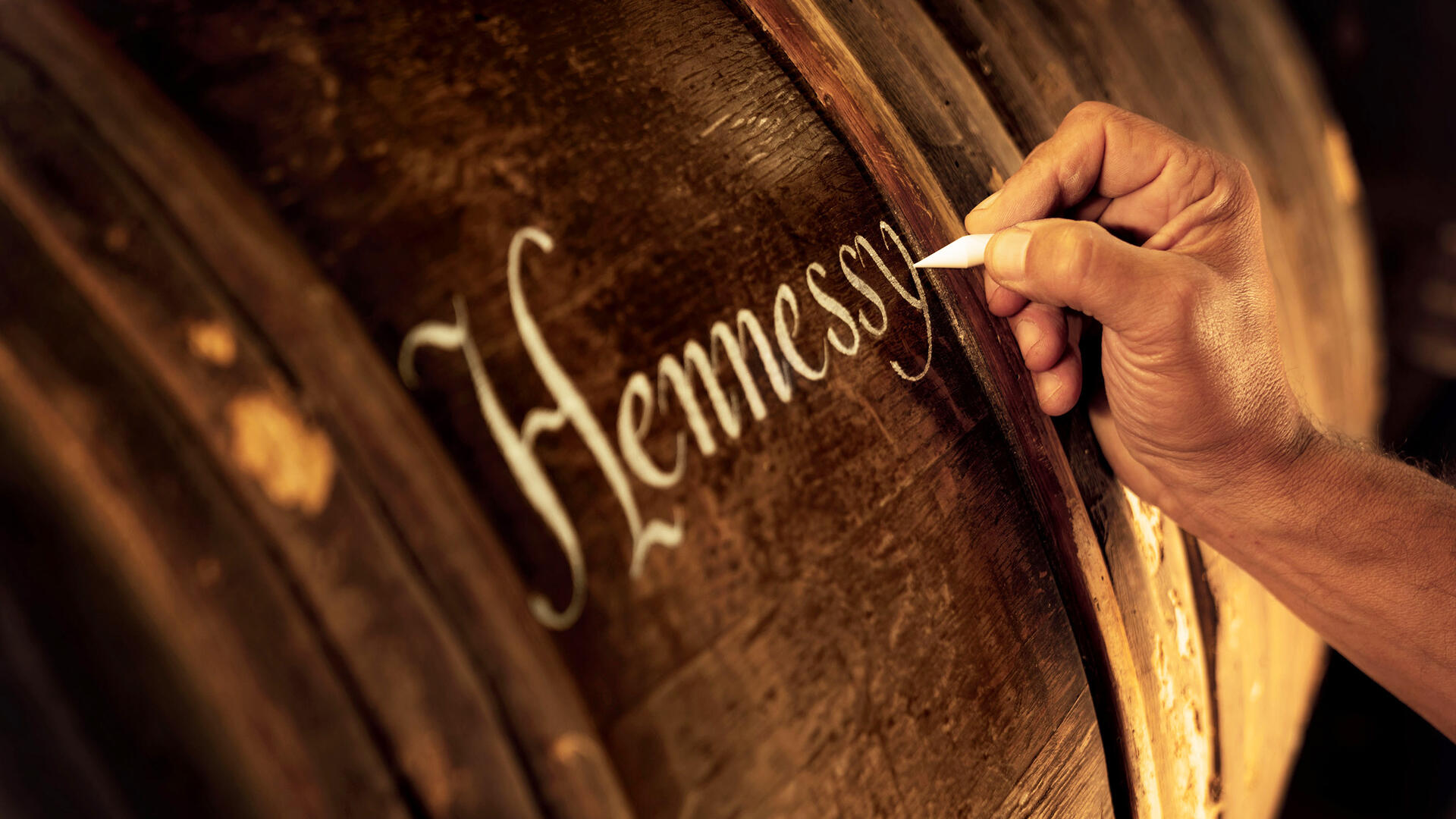 Hennessy oak barrel featuring traditional chalk calligraphy inscriptions
