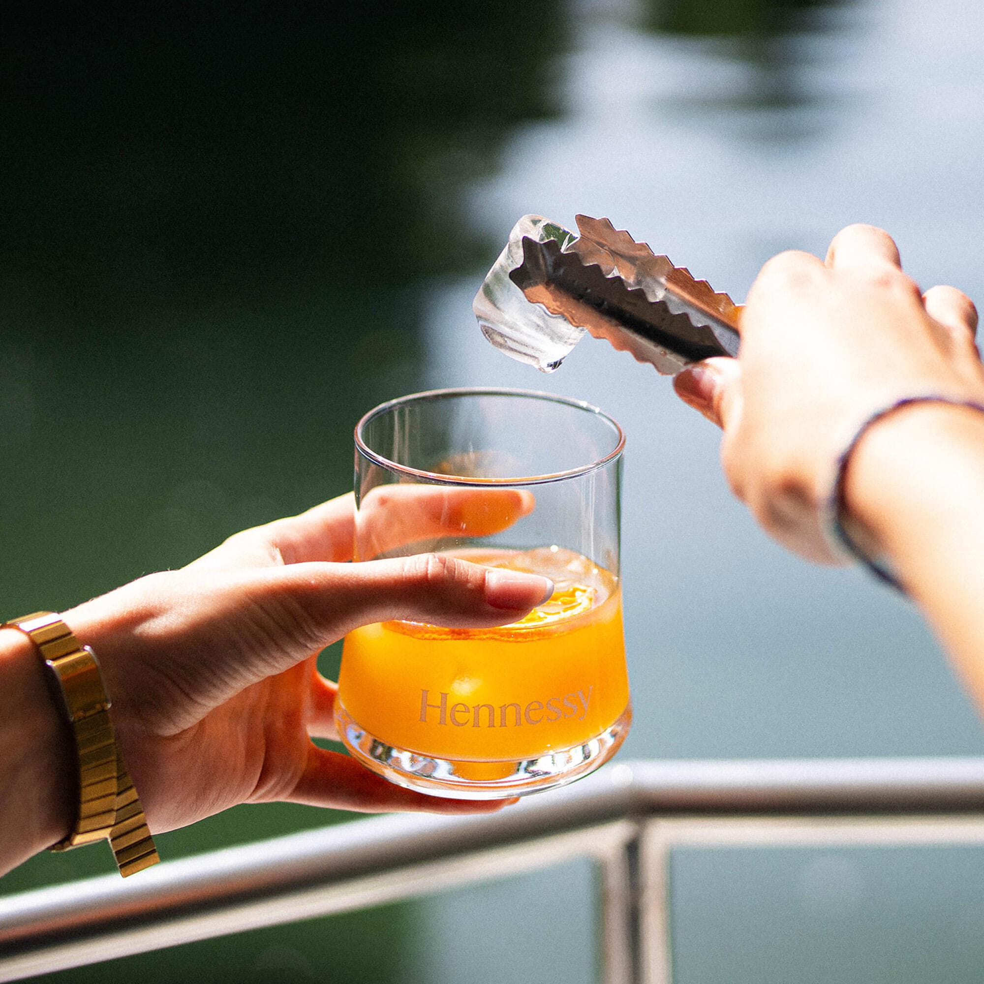 Hennessy cocktail being served by a profesisonal guide aboard the Hennessy boat during the Flash Tour